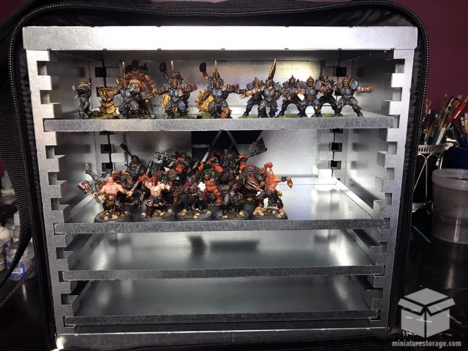 A-Case+, a magnetic miniature case, shown packed with models